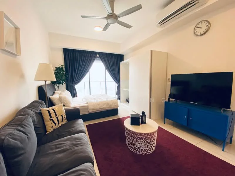 Living features: 3-seater fabric sofa in grey, coffee table with white top and decorative base, wall-mounted TV, blue TV console, floor-to-ceiling windows, blackout curtains, ceiling fan, air conditioning unit, clock on the wall, area rug in red, lamp beside sofa, bed in background with white bedding; style: modern; view: city.