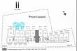 Floor plan: features: project layout, multiple building blocks, landscaped areas, parking spaces, pathways, common facilities.