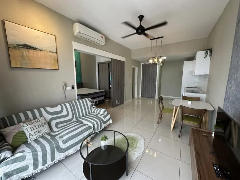Living features: 3-seater fabric sofa in green and white pattern, round coffee table with black glass top, wall-mounted TV, ceiling fan with light, recessed downlights, white painted walls, glossy tile flooring, decorative wall art, area rug with circular design; style: modern. Dining features: 4-seater dining table, green upholstered dining chairs, pendant lighting above table; style: modern. Kitchen features: white cabinetry, stainless-steel sink, built-in kitchen appliances, countertop with backsplash, open layout to living area; style: modern. Bedroom features: queen-size bed, grey bedding, curtains, built-in wardrobe, access to bathroom; style: modern.