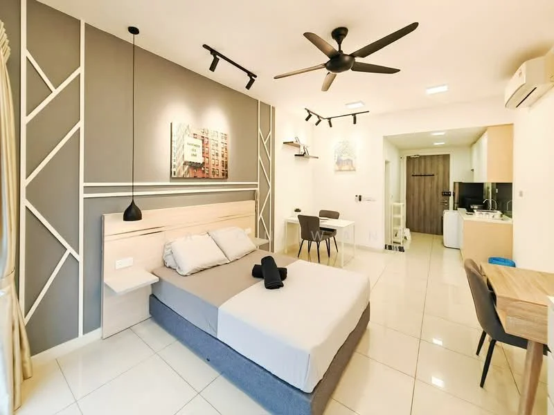 Bedroom features: queen-size bed with grey base, upholstered headboard, 2 bedside lamps, 5-blade ceiling fan with light, wall-mounted artwork, grey accent wall, white painted walls, tile flooring, dining table with 4 chairs, study desk, open kitchen area with cabinetry, refrigerator, built-in oven; style: modern.