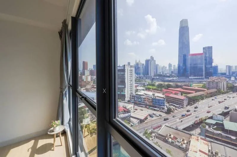 Room features: floor-to-ceiling windows, curtains, city skyline view, wooden flooring, small side table; style: modern; view: city.