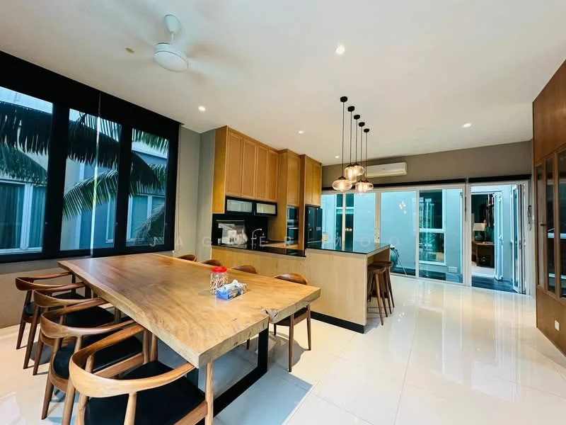 Kitchen features: wooden dining table with 8 chairs, kitchen island with bar seating, stainless-steel built-in oven, stainless-steel microwave, black countertop, wood cabinetry, pendant lighting over island, 5-blade ceiling fan, white tiled flooring, floor-to-ceiling windows, sliding glass door, greenery view; style: modern; view: garden.