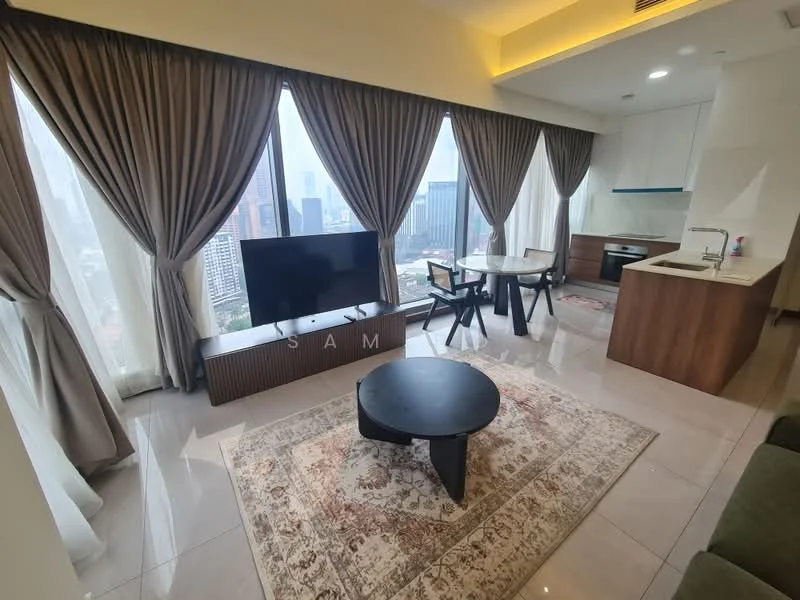 Living features: floor-to-ceiling windows, grey curtains, black coffee table, area rug with geometric pattern, 3-seater fabric sofa in green, TV console, wall-mounted TV, dining table for 4, kitchen island with sink, marble flooring, recessed downlights, open layout; style: modern; view: city.
