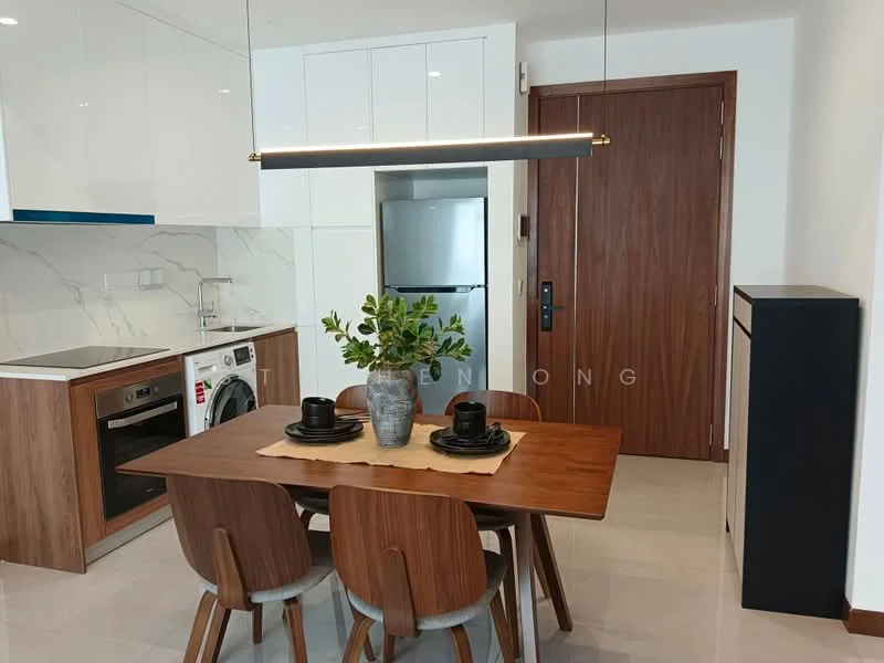Kitchen features: white cabinets, marble backsplash, black countertop, stainless-steel fridge, built-in oven, 4-burner gas hob, washing machine, pendant light, dining table with 4 chairs, decorative plant on table, grey tiled flooring, wooden dining table; style: modern.