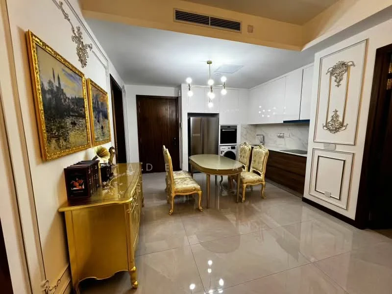 Dining features: golden dining table, 4 upholstered dining chairs in cream, white cabinetry, brown wooden lower cabinets, stainless-steel built-in oven, stainless-steel microwave, ceramic tile flooring, recessed ceiling lights, wall-mounted air conditioning unit, framed artwork on walls, decorative wall paneling; style: luxury.