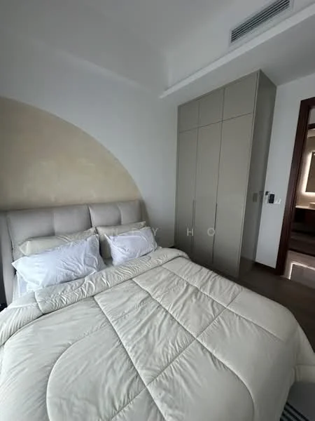 Bedroom features: king-size bed with upholstered headboard, white bedding, light-colored quilt, built-in wardrobe with sliding doors, neutral wall color, wooden flooring, recessed ceiling lights, floor-to-ceiling windows, curtains, decorative wall with curved design; style: modern.