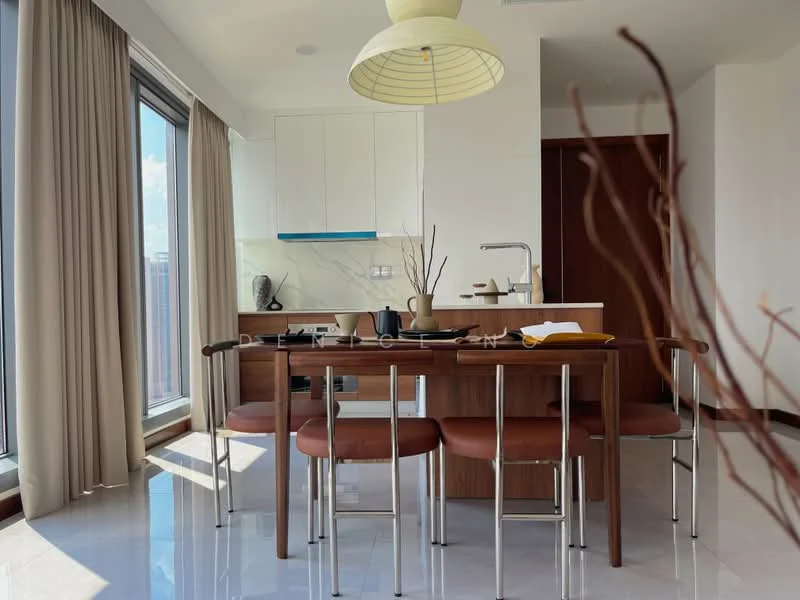 Dining features: 4-seater dining table, wooden dining table with a brown finish, metal legs on dining table, upholstered dining chairs in brown, pendant light fixture, floor-to-ceiling windows, sheer curtains, white cabinets, blue accent on cabinetry, stainless-steel sink, chrome pull-down faucet, marble flooring, decorative branches in vase; style: modern; view: city.