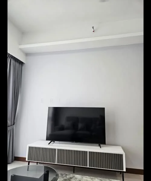 Living features: light grey painted walls, white ceiling, recessed downlights, floor-to-ceiling windows with sheer curtains, black TV console with storage, large flat-screen TV, area rug with geometric pattern, dark wood flooring; style: modern.