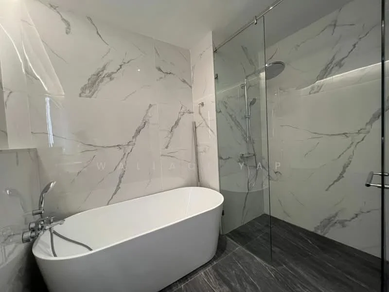 Bathroom features: freestanding bathtub, walk-in shower with glass enclosure, rain shower head, handheld shower, marble tile cladding on walls, dark grey tile flooring, chrome basin mixer faucet, glass shower screen; style: modern.