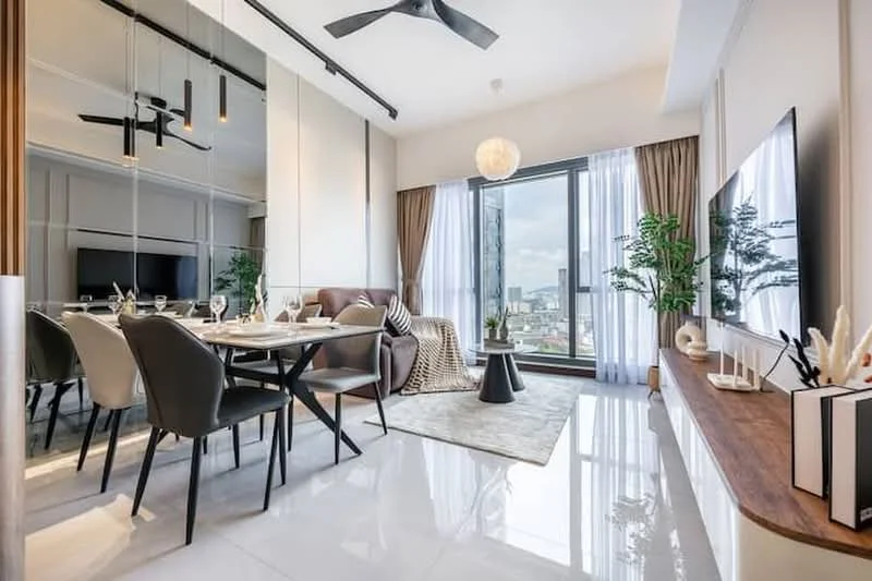 Living features: large floor-to-ceiling windows, city view, white walls, polished ceramic tile flooring, 5-blade ceiling fan, recessed downlights, wall-mounted TV, wooden TV console, decorative plants, area rug with geometric pattern, sofa with cushions, dining table with chairs, pendant lighting, decorative wall art; style: modern; view: city.