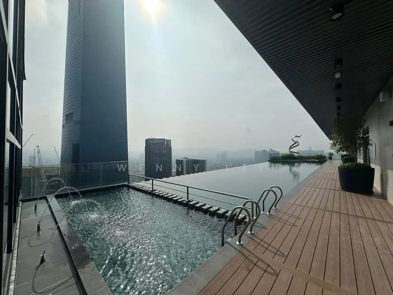 Exterior type: high-rise condominium; features: infinity pool, pool deck with loungers, wooden decking, glass railing, city skyline view, water feature with fountains, landscaped planters, modern architectural design; style: modern.