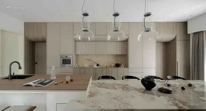 Kitchen features: island countertop with marble surface, single-bowl stainless-steel sink, chrome pull-down faucet, built-in oven, flat-panel cabinetry in light wood, white cabinetry with horizontal lines, 3 pendant lights above island, black dining chairs, open shelving, decorative vase on countertop, magazine on countertop; style: modern.