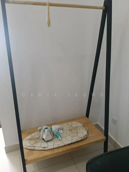 Room features: wooden bench, black metal frame, hanging rod, neutral-colored storage bag, floor tiles, white walls; style: modern.