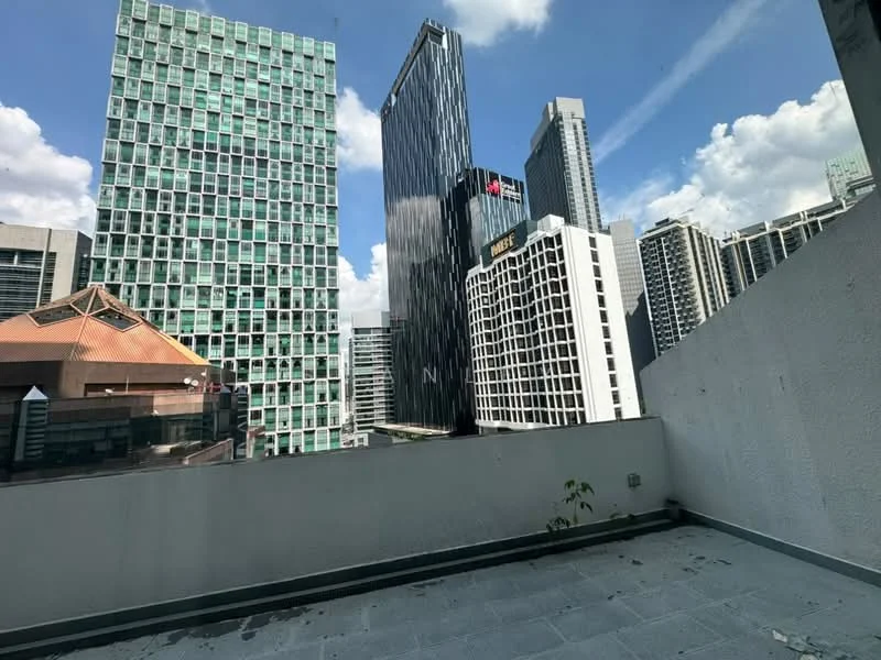 Exterior type: high-rise condominium; features: glass curtain wall, concrete facade, surrounded by urban skyline, rooftop terrace, city view, manicured landscaping, modern architecture; style: contemporary.