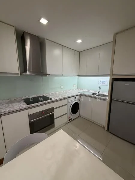 Kitchen features: white cabinetry, marble countertop, stainless-steel sink, chrome pull-down faucet, built-in oven, stainless-steel range hood, 4-burner gas hob, white washing machine, stainless-steel fridge, glass backsplash, tile flooring, recessed downlights, dining table, white chairs; style: modern.