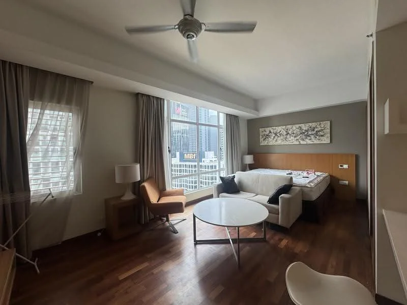 Living features: large floor-to-ceiling windows, wooden flooring, white painted walls, tray ceiling, 5-blade ceiling fan, sofa, coffee table, side table, table lamp, decorative artwork on wall, armchair; style: modern; view: city.
