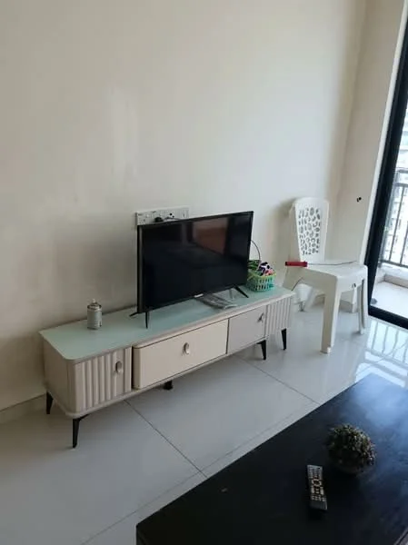 Living features: white painted walls, glossy tile flooring, TV console with drawers, flat-screen TV, plastic chair, glass top on TV console, decorative plant on coffee table, large window with balcony access; style: modern.