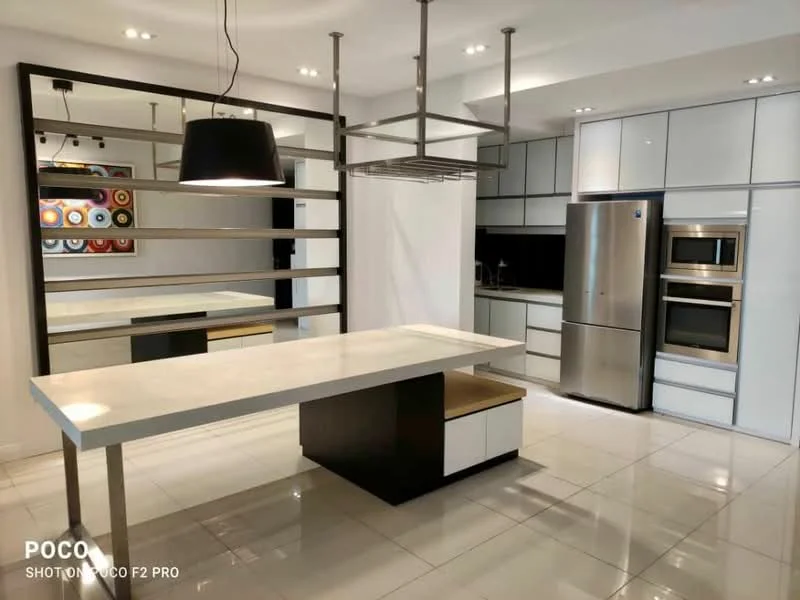 Kitchen features: white cabinetry with grey accents, large island with white countertop, stainless-steel fridge, built-in oven, microwave, pendant light above island, open shelving, black backsplash, ceramic tile flooring, recessed downlights, modern design, wall-mounted storage rack; style: modern.