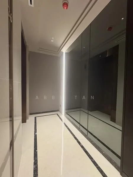 Room features: polished marble flooring, grey painted walls, mirrored wall, recessed lighting, ceiling with decorative trim, black accent strip on floor, modern light fixture, elevator access door; style: modern.