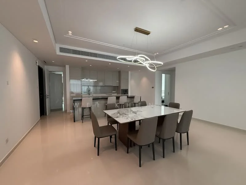 Dining features: large rectangular dining table, 8 upholstered dining chairs, modern chandelier, white painted walls, recessed downlights, marble dining table top, neutral tile flooring, open-plan layout with kitchen visible; style: modern. Kitchen features: built-in cabinetry, stainless-steel appliances, kitchen island, white countertops, glass backsplash, recessed lighting, open layout to dining area; style: modern.