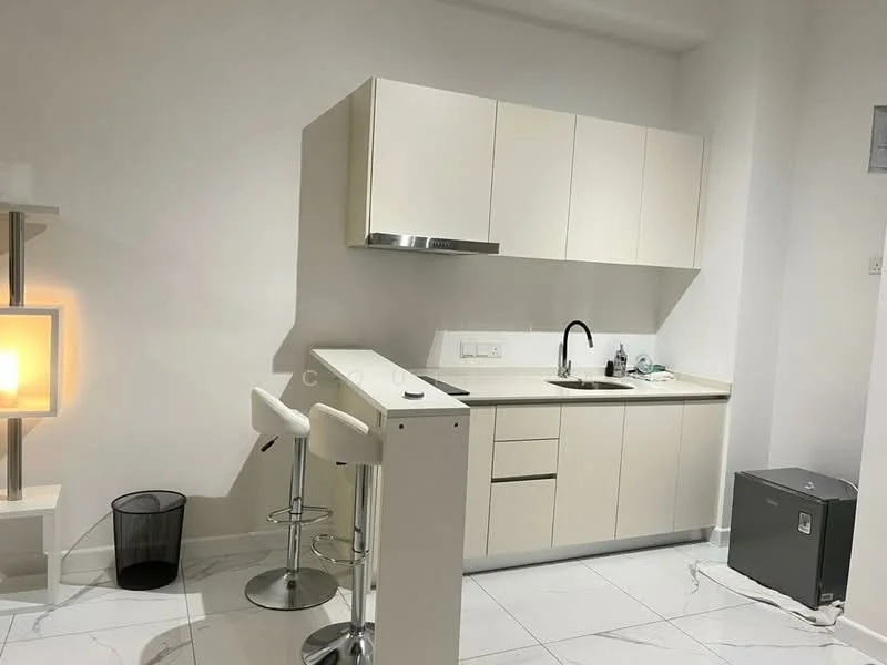 Kitchen features: white cabinetry, single-bowl stainless-steel sink, chrome pull-down faucet, white countertop, bar counter with two stools, built-in oven, refrigerator, marble tile flooring, white painted walls, under-cabinet lighting; style: modern.