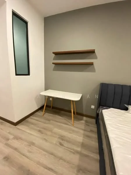 Room features: grey painted walls, wooden flooring, white table with wooden legs, floating wooden shelves, window with black frame, bed frame without mattress; style: modern.