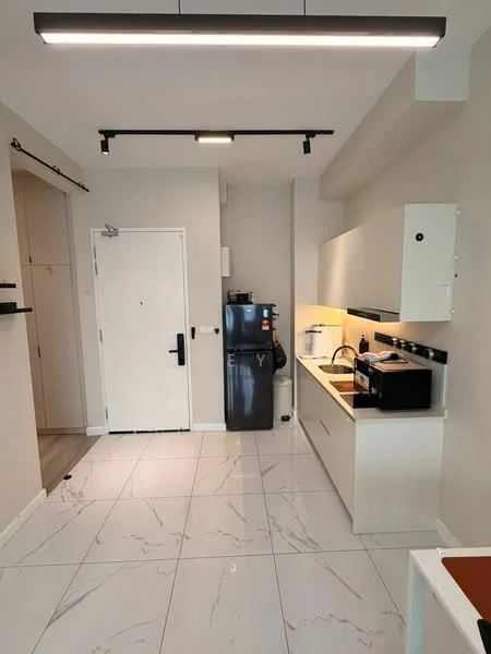 Kitchen features: white cabinetry, black countertop, stainless-steel fridge, built-in oven, ceramic cooktop, single-bowl stainless-steel sink, chrome pull-down faucet, marble tile flooring, recessed LED downlights, open shelving, wall-mounted cabinets, kitchen island, wall-mounted microwave; style: modern.