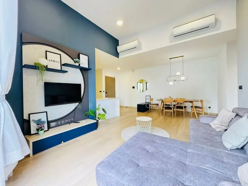 Living features: grey fabric sectional sofa, round area rug, wall-mounted TV, decorative wall panel with circular design, shelves with decorative plants, 2 wall-mounted split AC units, dining table with 6 wooden chairs, open kitchen area, pendant lighting above dining table, large window with sheer curtains, light wood flooring, white painted walls, ceiling lights; style: modern.