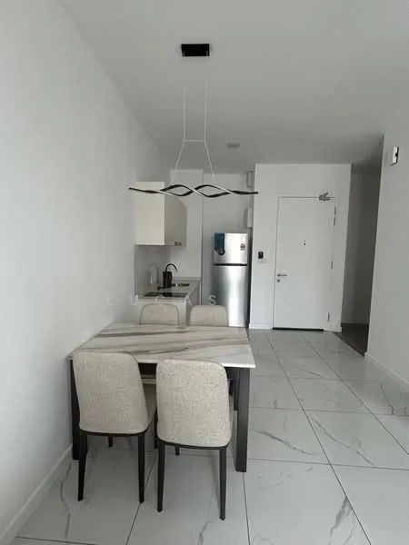 Dining features: 4-seater dining table with marble top, upholstered dining chairs in light grey, pendant light fixture, white painted walls, tile flooring with marble pattern, open kitchen area visible, stainless-steel fridge, single-bowl stainless-steel sink, chrome pull-down faucet, white cabinetry, door leading to hallway; style: modern.