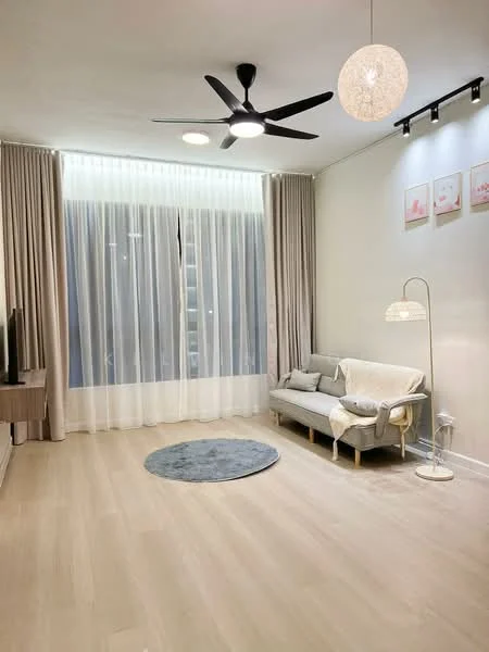 Living features: light wood flooring, floor-to-ceiling windows, sheer curtains, 5-blade ceiling fan with light, pendant light, sofa in light grey, decorative throw blanket, area rug in grey, side lamp, TV console, wall-mounted TV, framed artwork on walls; style: modern.