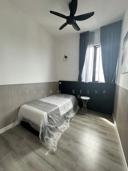 Bedroom features: single bed, grey bedding, wooden flooring, white painted walls, dark accent wall, floor-to-ceiling window, blackout curtains, ceiling fan, small side table; style: modern.