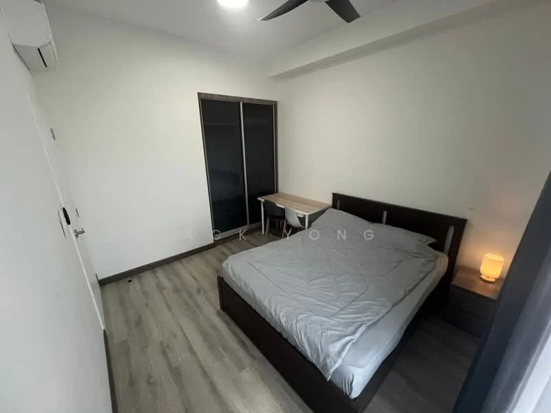 Bedroom features: queen-size bed, light grey bedding, wooden bed frame, nightstand with lamp, study desk, black sliding wardrobe, laminate flooring, ceiling fan with light, wall-mounted air conditioning unit, white painted walls; style: modern.