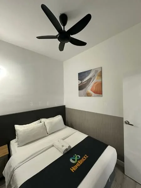 Bedroom features: queen-size bed with white bedding, upholstered headboard, 2 bedside tables, wall-mounted artwork, ceiling fan, white painted walls, wood paneling on lower wall, laminate flooring, window with white curtains, door with silver handle; style: modern.