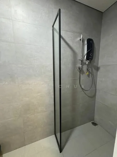 Bathroom features: walk-in shower with glass enclosure, chrome handheld shower, grey tile cladding on walls, light grey tile flooring, shower head, wall-mounted water heater, drain in floor; style: modern.