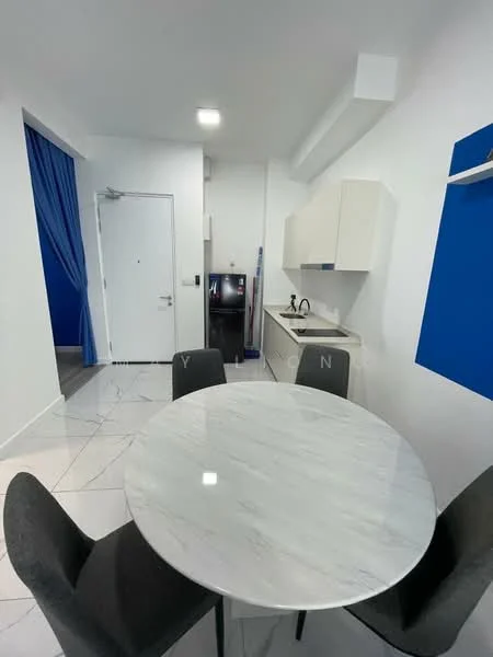 Dining features: round marble dining table, 4 upholstered dining chairs in grey, white painted walls, blue accent wall, tile flooring, recessed downlights, kitchenette with white cabinetry, stainless-steel sink, chrome pull-down faucet, built-in kitchen appliances, door leading to hallway; style: modern.