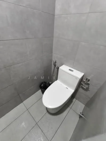 Bathroom features: one-piece toilet, grey tiled walls, grey tiled flooring, chrome toilet paper holder, bidet spray, waste bin; style: modern.