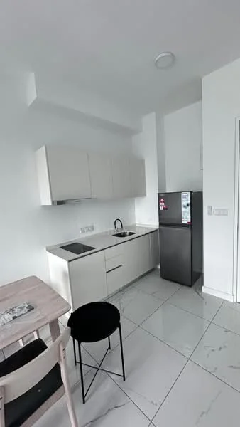 Kitchen features: white cabinetry, black countertop, single-bowl stainless-steel sink, chrome pull-down faucet, built-in stove, refrigerator, marble tile flooring, wall-mounted cabinets, dining table, black chair; style: modern.