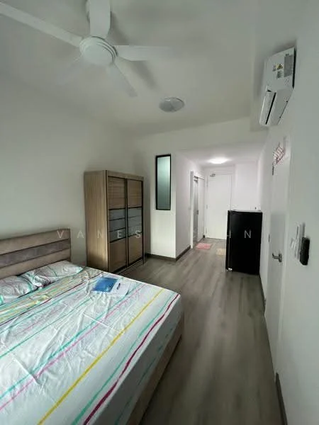 Bedroom features: queen-size bed, upholstered headboard, bedding with colorful stripes, wooden wardrobe with glass doors, laminate flooring, ceiling fan, wall-mounted air conditioning unit, fridge, light fixture in ceiling, neutral painted walls, doorway leading to hallway; style: modern.