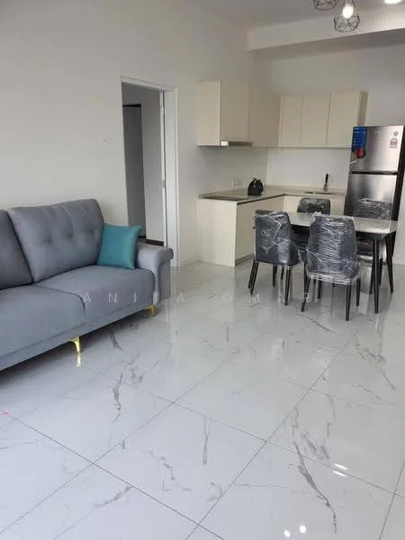 Living features: grey fabric sofa with gold legs, marble tile flooring, white painted walls, recessed downlights, decorative cushion in teal, glass dining table, 4 transparent dining chairs, kitchen cabinetry in light color, stainless-steel fridge, kettle on countertop; style: modern.