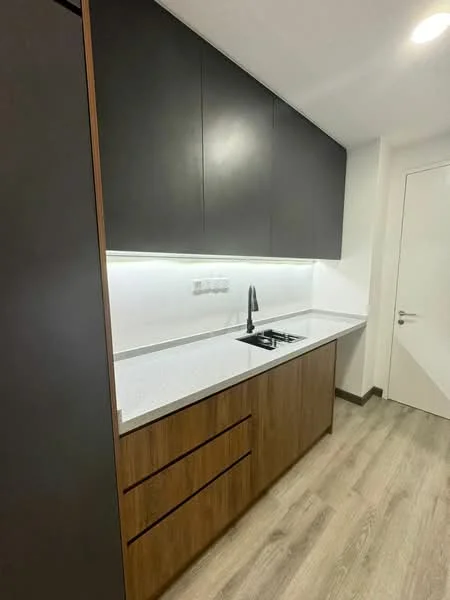 Kitchen features: black cabinetry, wooden lower cabinets, white quartz countertop, single-bowl stainless-steel sink, black pull-down faucet, recessed LED downlights, light grey laminate flooring, white wall with light switch, modern cabinet handles; style: modern.
