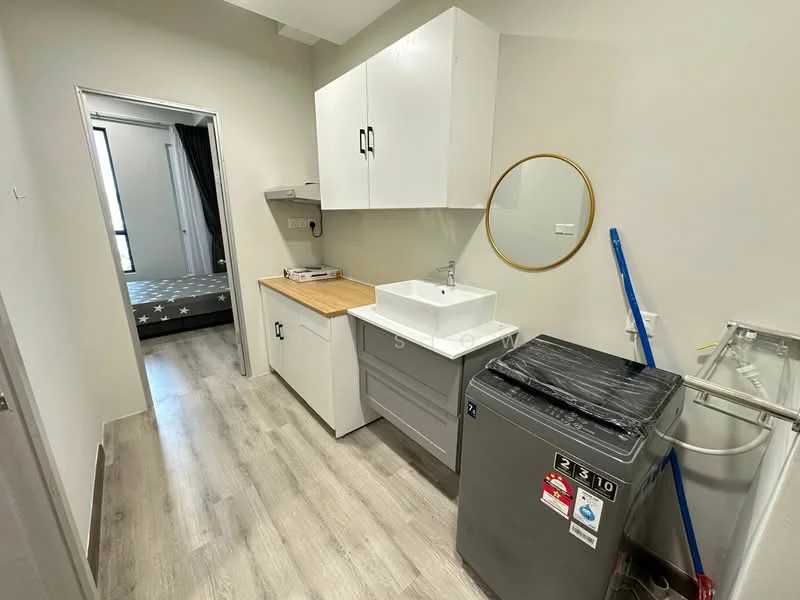 Laundry features: white cabinetry, wood countertop, single-bowl ceramic sink, chrome faucet, front-load washing machine, grey trash bin, mirror, vinyl plank flooring, light grey painted walls, broom, laundry area with space for additional appliances; style: modern.