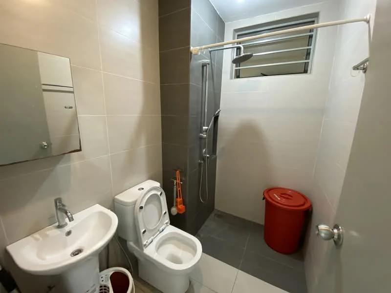 Bathroom features: white tiled walls, grey tiled accent wall, ceramic tile flooring, single-sink vanity with mirror, one-piece toilet, walk-in shower with glass partition, rain shower head, handheld shower, red plastic trash bin, shower rod with curtain, window for natural light; style: modern.