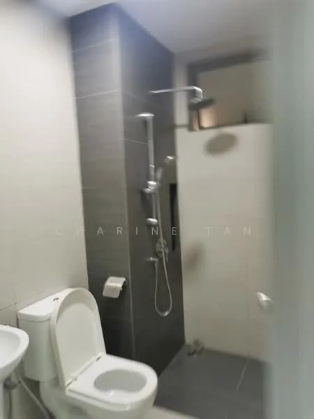 Bathroom features: one-piece toilet, walk-in shower with glass enclosure, rain shower head, handheld shower, chrome basin mixer, grey tile flooring, grey wall tiles, white wall tiles, toilet paper holder, towel rack; style: modern.