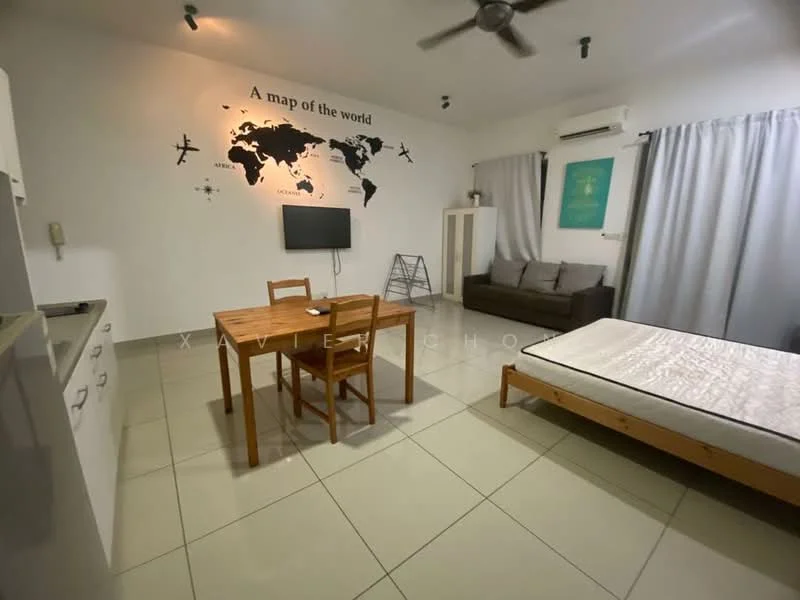 Living features: grey fabric sofa, wooden dining table with four chairs, queen-size bed frame without mattress, wall-mounted TV, map of the world wall decal, ceiling fan, air conditioning unit, light-colored tiled flooring, white painted walls, curtains in light grey, folding chair, open layout; style: modern.