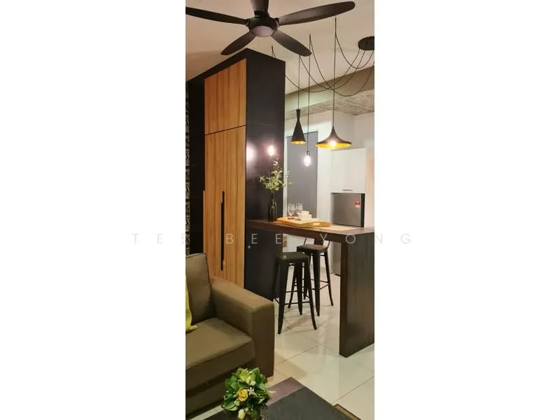 Living features: 3-seater fabric sofa in grey, coffee table, pendant lamps, 5-blade ceiling fan, open shelving, wood cabinetry, black accent wall, white tiled flooring, bar stools, kitchen island, decorative plant; style: modern.