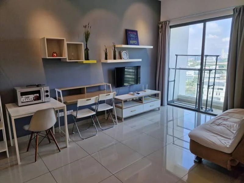 Living features: white painted walls, grey accent wall, glossy tile flooring, floor-to-ceiling windows, sheer curtains, white shelving unit, wall-mounted TV, white TV console, small dining table with 2 chairs, microwave, sofa bed, decorative plant; style: modern; view: city.