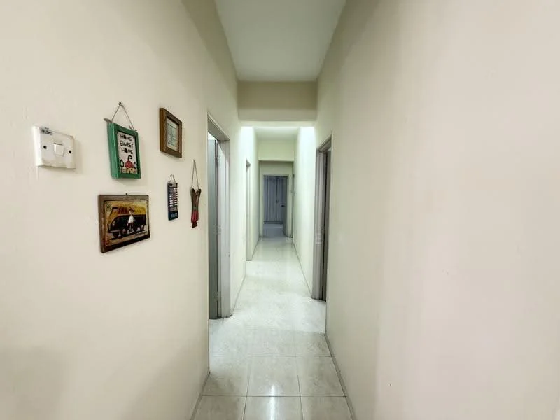 Hallway features: white painted walls, glossy ceramic tile flooring, recessed lighting, decorative wall art, two doorways leading to other rooms, neutral color scheme, narrow corridor layout; style: modern.