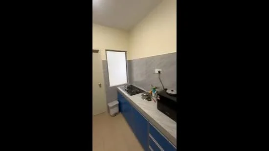 Kitchen features: blue cabinetry, white marble countertop, stainless-steel sink, 4-burner gas hob, black microwave, white walls, tile flooring, window with no treatment, kitchen trash bin, black kitchen appliance; style: modern.