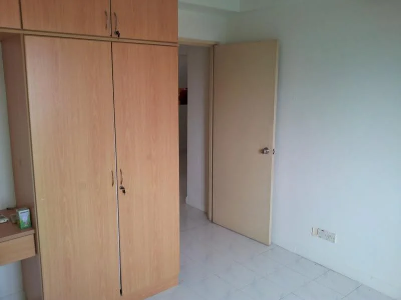 Room features: light wood cabinetry, built-in wardrobe, white walls, white tiled flooring, door leading to another room, desk with drawer, neutral color scheme; style: minimalist.