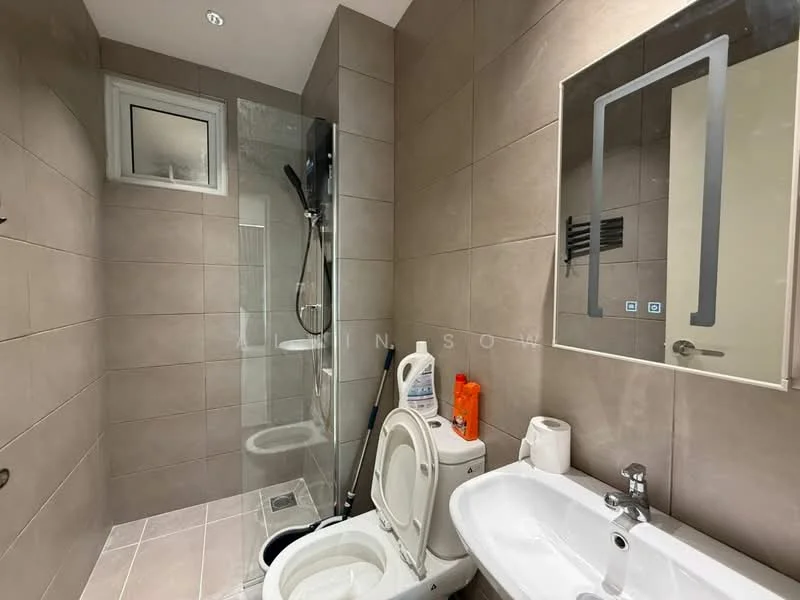 Bathroom features: grey tiled walls, light grey tiled flooring, walk-in shower with glass enclosure, rain shower head, handheld shower, single-sink vanity with white cabinet, chrome basin mixer, framed mirror, one-piece toilet, toilet paper holder, soap dispenser, window for natural light; style: modern.